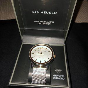 Van Heusen Genuine Diamond Collection Silver men's metal watch.